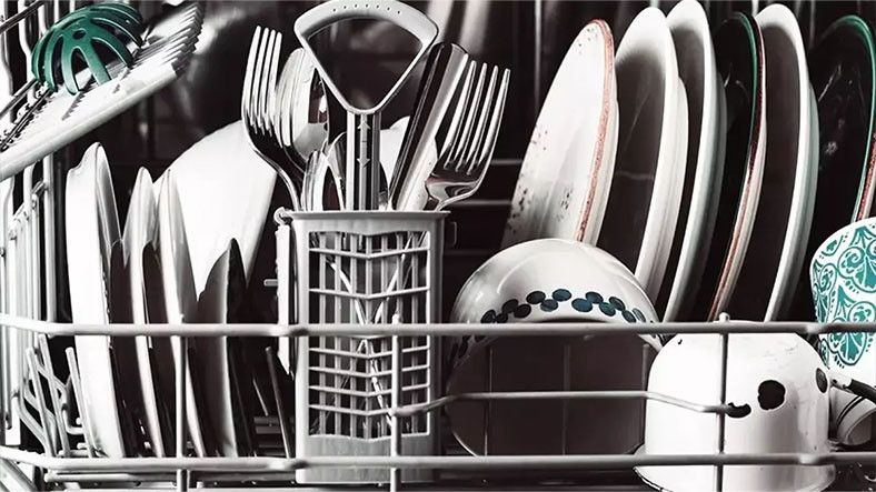 Why do plastics come out with water droplets on them, while everything washed in the dishwasher becomes bone dry?